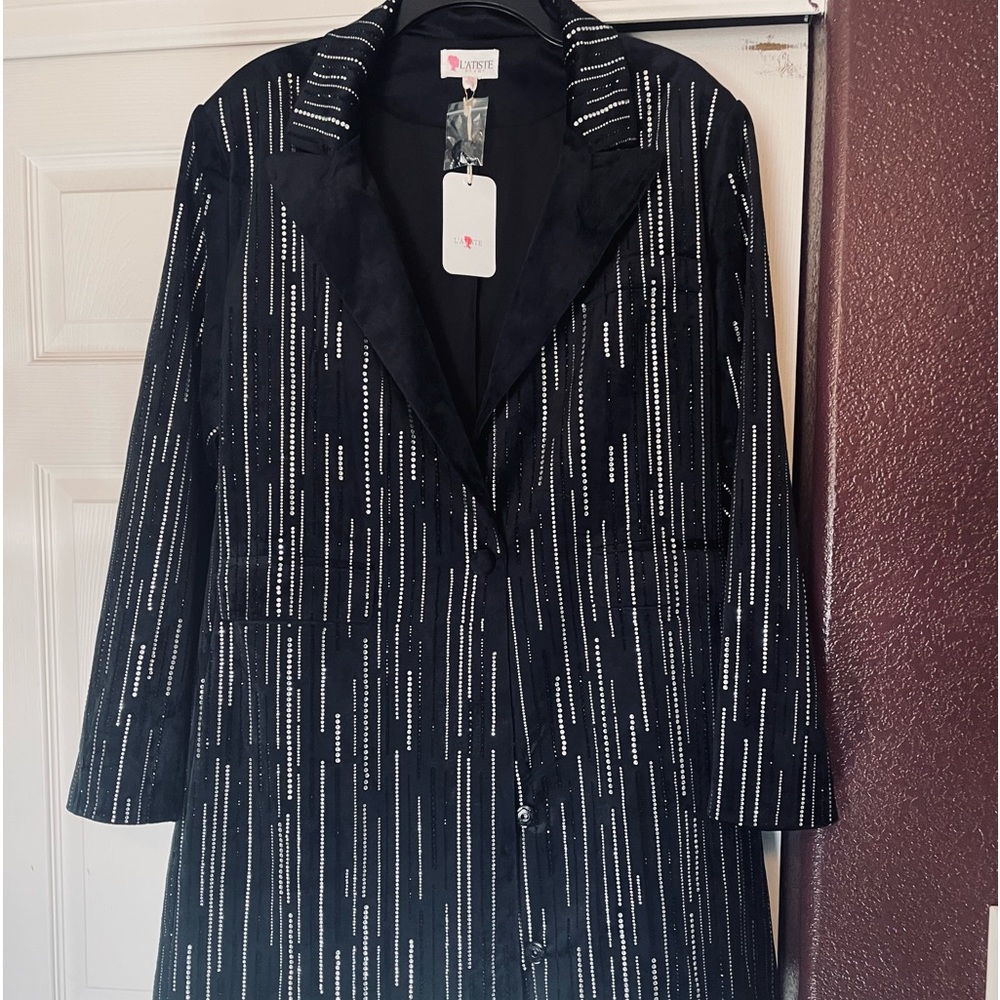 Beautiful Velvet with hand laid rhinestones jacket includes matching belt.